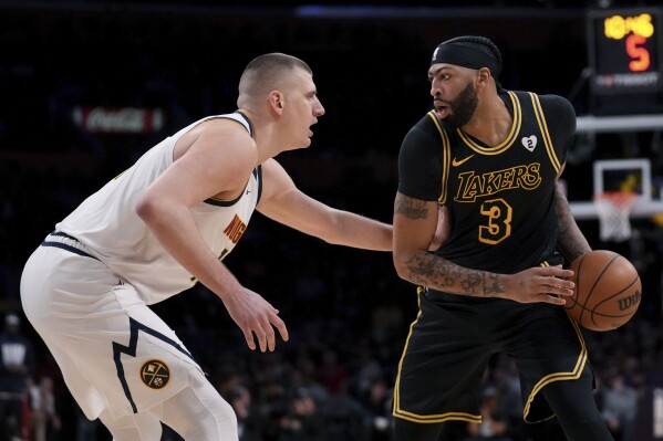 Jamal Murray scores 29 points and Nuggets hold off Lakers in the